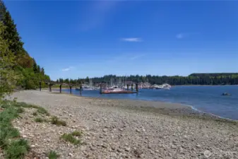 Beach below condo with view of the marina