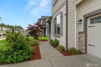 Follow the path to your next beginning—beautiful curb appeal and a charming front entry that sets the tone for the rest of the home