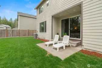 Step right out to your private patio—perfect for morning coffee, evening unwinds, or soaking up the sun while enjoying the fully fenced backyard.