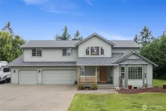 Four Bedroom well maintained home sitting on an acre feels like country living!
