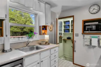 Stainless steel sink, microwave, making the best of available spaces.