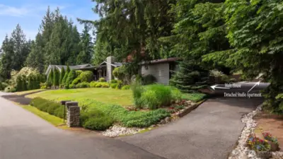 **Privacy fence (and power lines) digitally removed to show what front of home would look like without privacy fence. Done for visual purposes only!