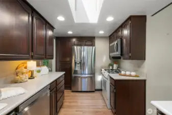 Newer SS Fridge and Dishwasher. Large built in pantry with sliding shelving for easy access!