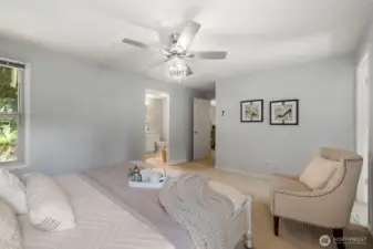Primary bedroom, easily accommodates a king sized bed with room to spare!