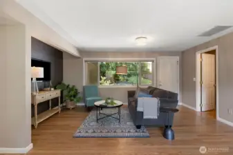 Great room with access to the fenced back yard and patios!