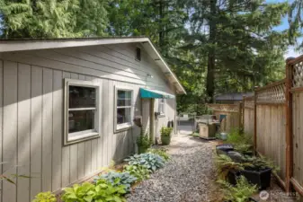 Side yard for the DADU Studio apartment. Currently rented for $1650/mth! The current tenant would LOVE to stay if able!