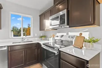 Photographs are for illustrative purposes only. Features, finishes, interior/exterior colors, landscaping and floorplan shown may vary from actual homes built.