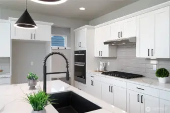 Photos are of another home in the community and are for illustration purposes only to reflect typical finishes.  May depict seller enhancements.  Colors and options may vary.