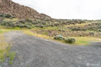 Driveway from building site to range.