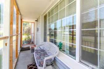 This is the enclosed front porch area to relax