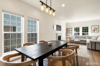 Spacious dining/living room combo offers a seamless flow and a beautiful focal point with views to the fireplace.