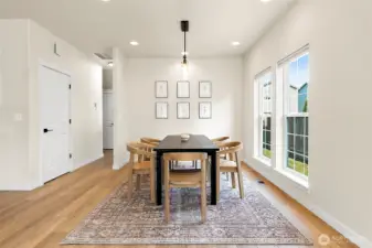 Light and bright dining space with an open, airy feel—ideal for entertaining or enjoying casual dinners.