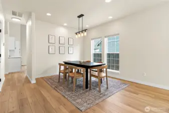 Convenient access from the dining room to the kitchen, offering seamless entertaining and space to accommodate all.