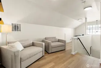 Upstairs bonus room offers endless possibilities—entertain, work, or relax in style.