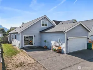 AC was added in 2022 along with a plethora of interior updates.  Convenient alley access for the two car garage and plenty of parking in the driveway for guests.