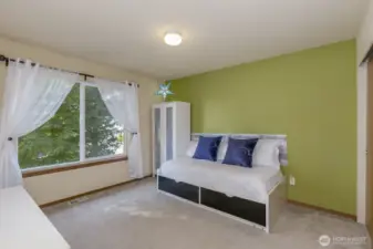 1 of 3 upper bedrooms.  This one with a peaceful garden view.