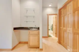 Wet bar and massive hallway linen closet