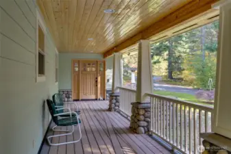 Covered front deck/ porch area. Perfect for sipping your morning coffee & watching the wildlife