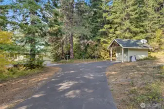 Fully paved driveway. Pump house features a 3/4 bathroom ideal for those quick clean offs after a full day of fun in the mountains