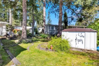 Backyard includes storage shed