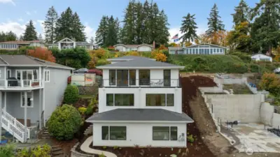 View side of home. Foundation to right is for a future home.