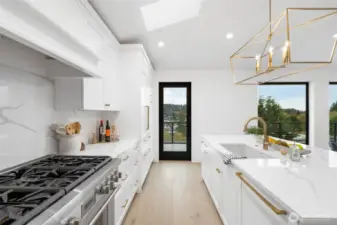Kitchen with propane stove top.