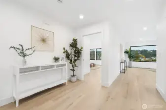 2nd level down.  Primary bedroom and den (or bonus room).  Both with views.