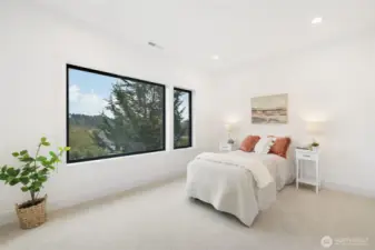 3rd bedroom on lowest level.  Don't need 4 bedrooms?  Could be a den with a view?