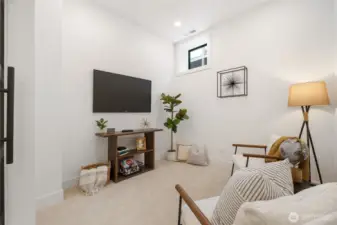 Flex room. Set up as a video game room.  Lots of possibilities.