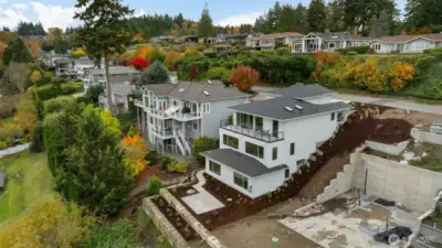 The foundation next to home is for a future home.  Potential to purchase lot or to have a home built.  Plans have been approved.