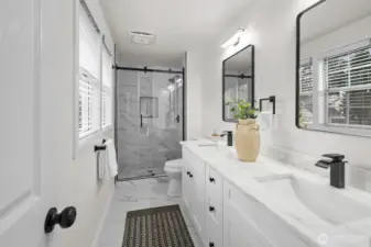 A stunning primary suite adorned with luxurious finishes and sophisticated designer touches.