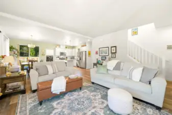 The living room flows right into the open dining and kitchen space.  Perfect for entertaining friends and family.