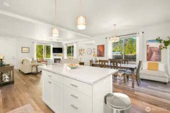 The kitchen has beautiful quartz countertops and this center island that provides extra storage and lots of counter space.