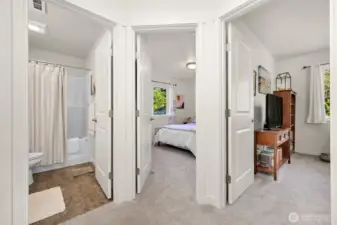 Landing at the top of the stairs leads to the guest bath, spare bedroom and office space.