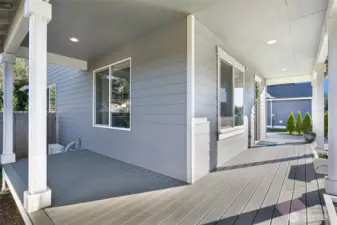 Huge wrap around front and side porch perfect for a rocking chair.