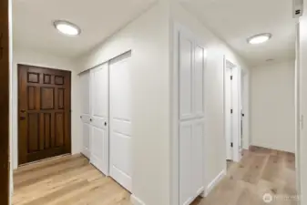 Oversized entry closet and around the corner built-in linen closet!