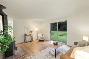 Large living room with sliding glass door to big back yard!