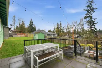 Custom two level patio with cooking space and fire pit