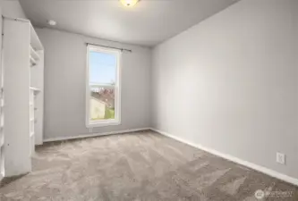 1st bedroom used as a nursery had a custom shelf for newborn clothing. It is removable.