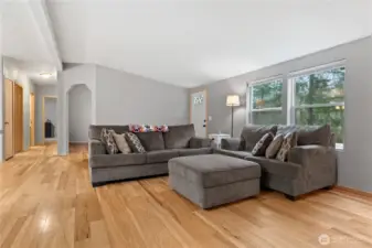 Super cozy living room with vaulted ceilings and tons of natural light.