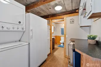 Laundry room on the main level with access to bathroom on main floor