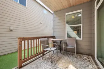 Side yard, 10-12 feet between houses, for exclusive use, includes this great covered area plus turf lawn
