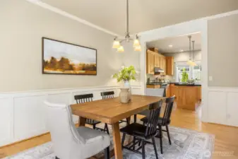 This larege dining space opens up to both the kitchen and the living room. Providing separate yet open spaces.