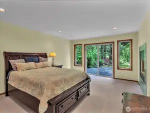 Main floor primary room has a double sided gas fireplace and amazing views of Mt Si and the river.