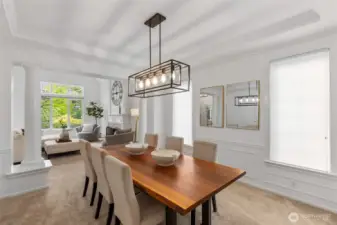 Designer light fixtures & stately columns.