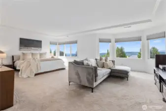 Oversized primary suite with remote blinds.