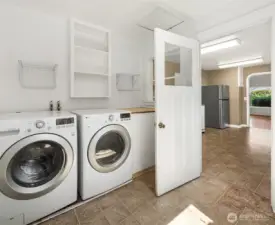 Laundry room with built in storage.