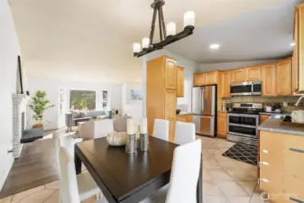 Dining room is open to both the kitchen and living room