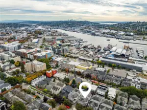 Mt Rainier frames the city skyline. Downtown Ballard's restaurants and shops just steps away. The Ballard Bridge; one of the old bascule bridges. Ballard's working waterfront.