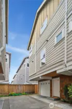 End unit with attached garage.